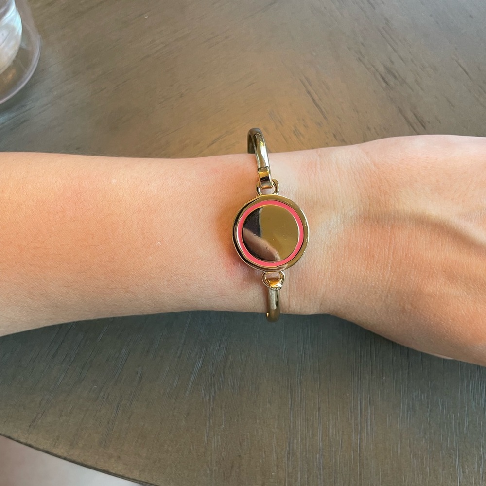 Gold and coral circle bracelet.